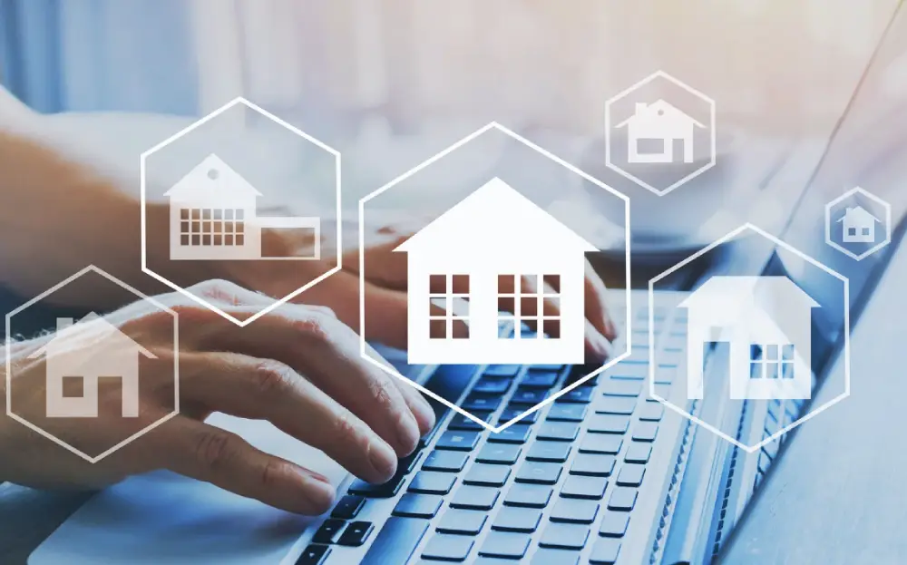 Hands over a keyboard with property icons overlaid
